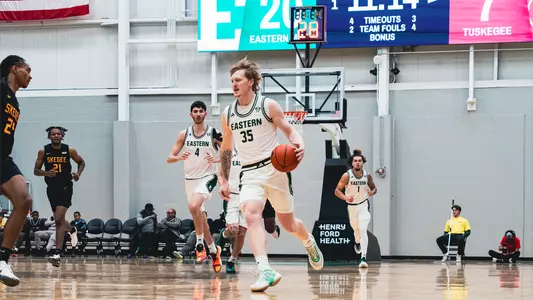 Merritt Alderink running with basketball