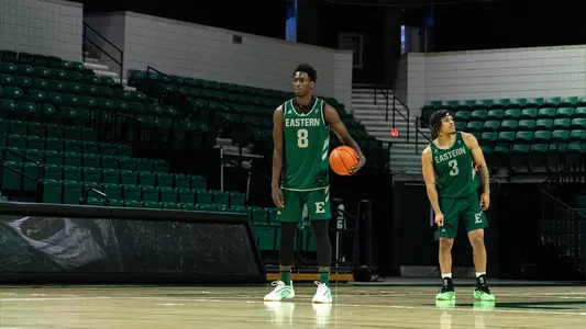 Mbaye N'Diaye standing on court with ball at practice