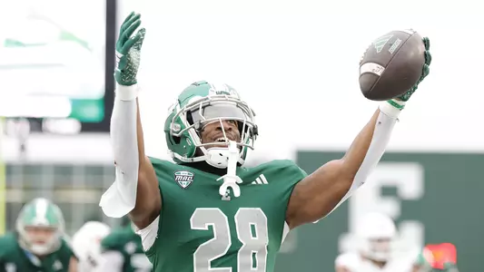 Dontae McMillan celebrates his 8-yard rushing touchdown in the end zone against Bowling Green