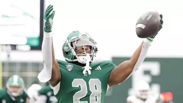 Dontae McMillan celebrates his 8-yard rushing touchdown in the end zone against Bowling Green
