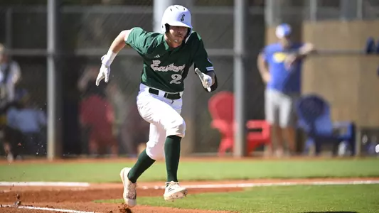 Brendan Kleiman runs to first base against Pitt, Feb. 15, 2024