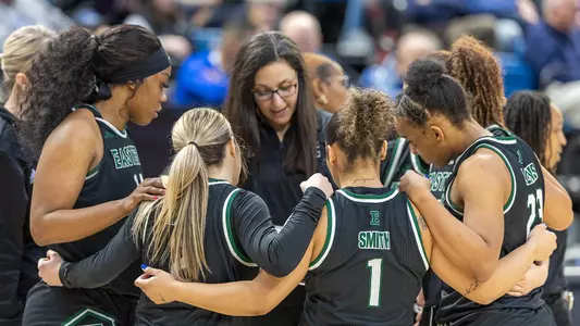 Women's Basketball team huddle at Buffalo 2025 season