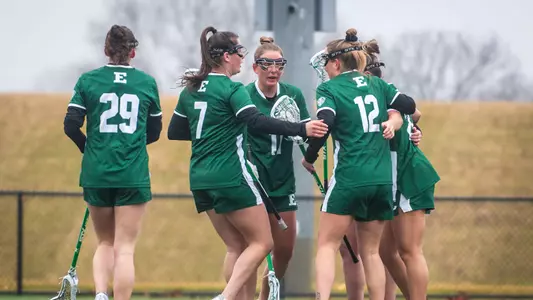 Group huddle after goal in 2025 lacrosse season