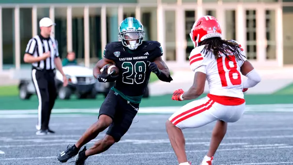 Dontae McMillan carries the ball against Louisina