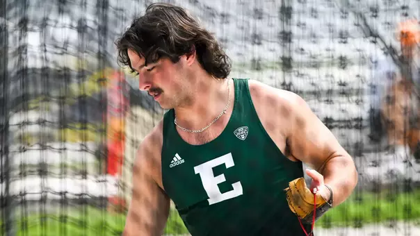 Jake McEachern holding a weight