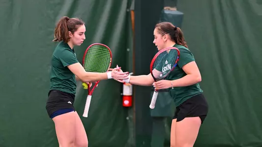 Matilde Parreira and Sabrina Tolstova celebrate a doubles point win