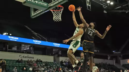 Braelon Green attempting to shoot a basketball against Kent State, Jan. 24, 2026