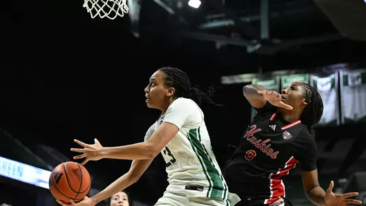 Peyton Hill shoots a reverse layup against Northern Illinois, Jan. 24