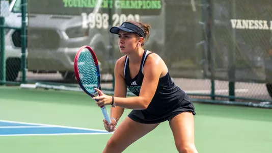 Sabrina Tolstova prepares to receive a serve at the EMU Hidden Duals