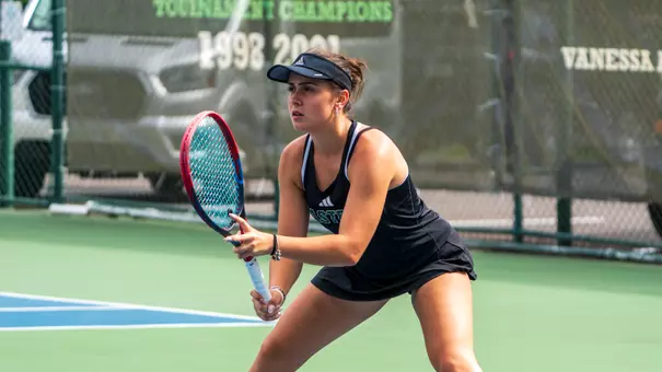 Sabrina Tolstova prepares to receive a serve at the EMU Hidden Duals