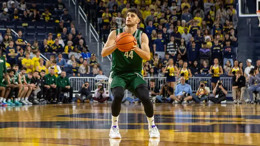 Aviv Aronov attempts a three-pointer at Michigan, October 11, 2026