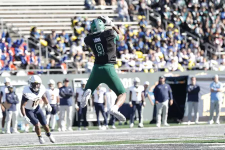 Joshua Long jumps for a reception against Toledo