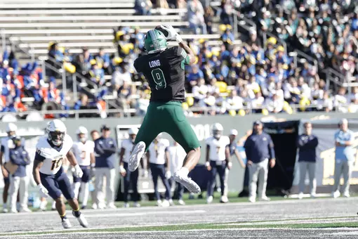 Joshua Long jumps for a reception against Toledo