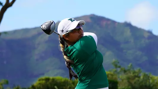 Karen Tsuru watches her drive travel down the fairway at the Ocean Course at Hokuala in Hawai'i