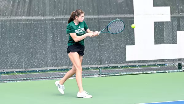 Kseniia Saenko returns a shot at the Chippewa Club during the EMU Hidden Duals