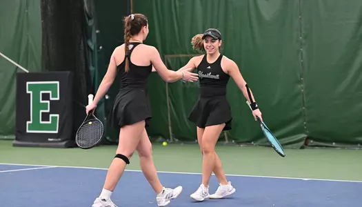 Regina Mendez Carreno and Iva Daneva celebrate a point earned against Oakland