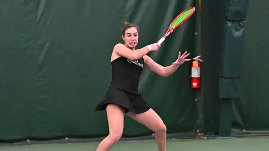 Matilde Parreira returns a shot in doubles action against Oakland