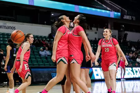 Alli Zajac and Brooklyn Thrash chest bump to celebrate a good play against Buffalo, Feb. 21, 2026