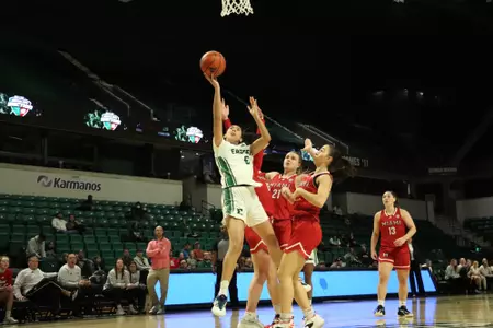 Fernanda Ovalle attempts a contested layup against Miami, Feb. 25