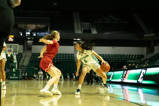 Fernanda Ovalle dribbles the basketball at home against Miami, Feb. 25, 2026