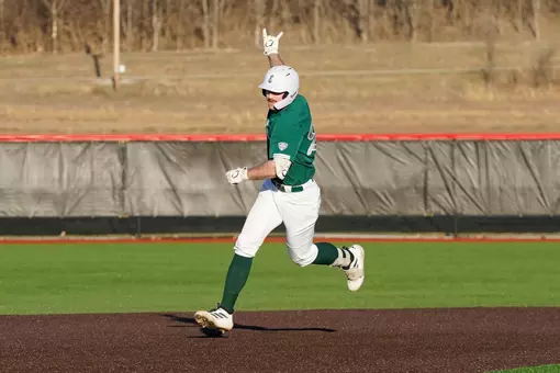 Ty Stecko celebrates a home run as he rounds second base at SIUE, Feb. 27, 2026