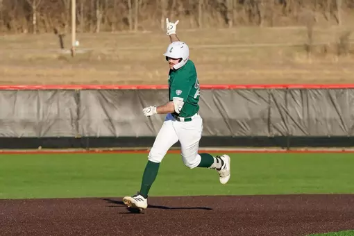Ty Stecko celebrates a home run as he rounds second base at SIUE, Feb. 27, 2026