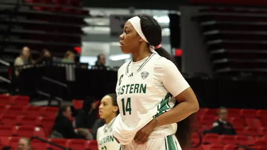 Sisi Eleko jogging up the basketball court at Northern Illinois