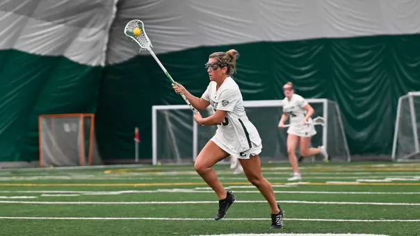 Mackenzie Blackwell brings the ball toward the goal in a game with Charleston (West Virginia)