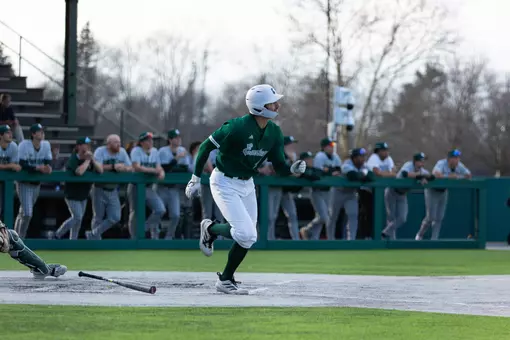 Devan Zirwas watches the ball he just hit as he runs to first base against Michigan State, March 10, 2026