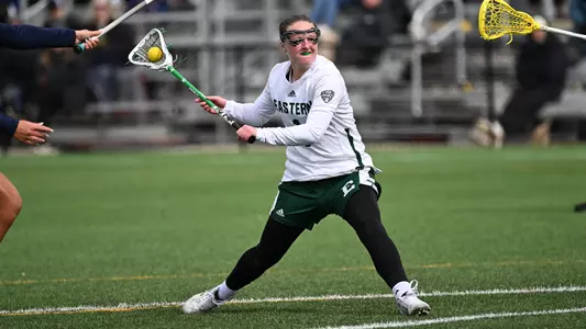 Tracy Grollman winds up and prepares to rip a shot on goal against Kent State