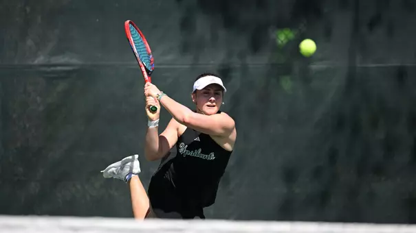 Sabrina Tolstova returns a shot down the line against Stetson