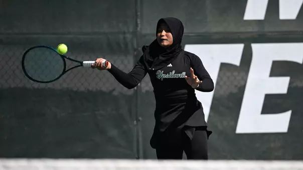 Cylova Zuleyka Hukmasabiyya returns the ball in a match at Stetson while playing singles at the No. 1 position