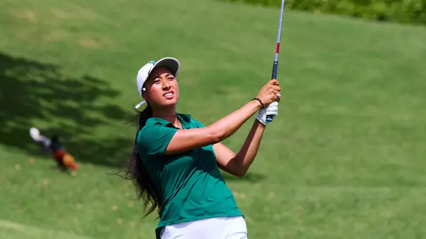 Jasmine Leovao watches her shot head toward the green at the Rainbow Wahine Invitational