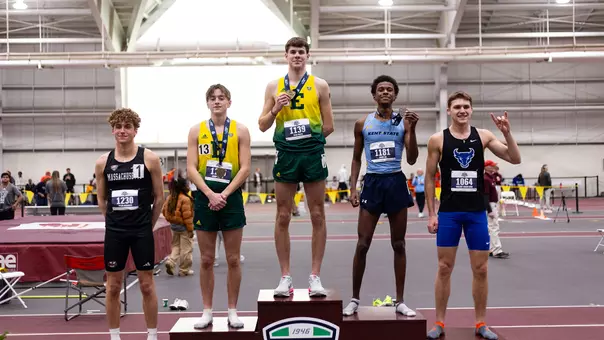 Kian Wiles and Jimmy Geller on the men's mile podium at the 2025 Indoor MAC Championships, Feb. 28, 2026