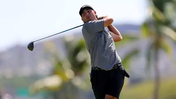 Leo Mihaich tees off in Hawaii