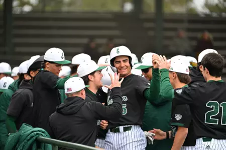 Devan Zirwas celebrates in the dugout after hitting a sacrifice fly against Central Michigan, March 29, 2026