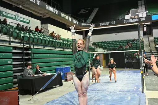 Keeley Kohler after performing bars at the EMU tri meet