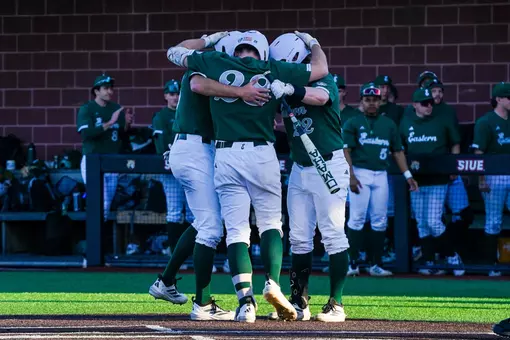 2026 baseball team celebrates at home plate after hitting a home run at SIUE