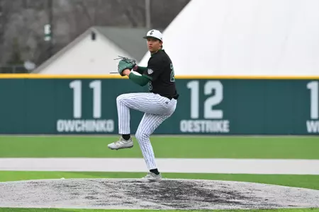 John Carmichael pitches at home against UMass, April 10, 2026