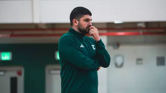 Hassan Nizam coaching basketball, April 2026