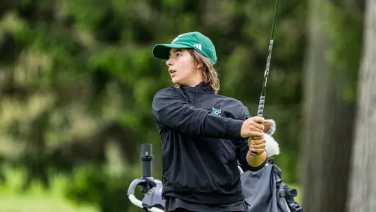 Savannah de Bock holds her follow through after hitting an approach shot into the fourth green at the 2026 MAC Championships at Firestone Country Club in Akron, Ohio