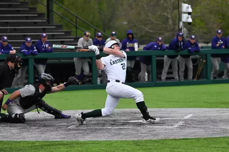 Nathan Borchardt swings the baseball bat to hit a home run against Washington at Oestrike Stadium, April 28, 2026