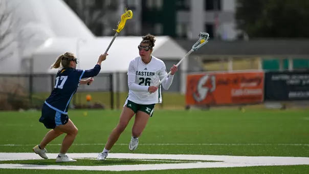 Emerson Henry dodges a defender on her way to the goal in a game against Kent State