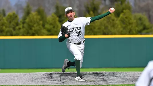 Carter White throwing a breaking ball against Michigan, April 6, 2026