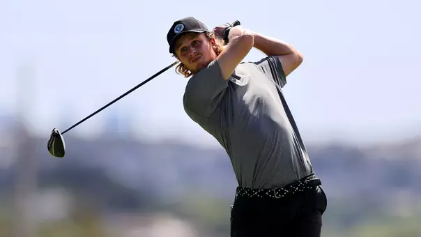 Joshua Hess finishes his swing on a shot in Hawaii