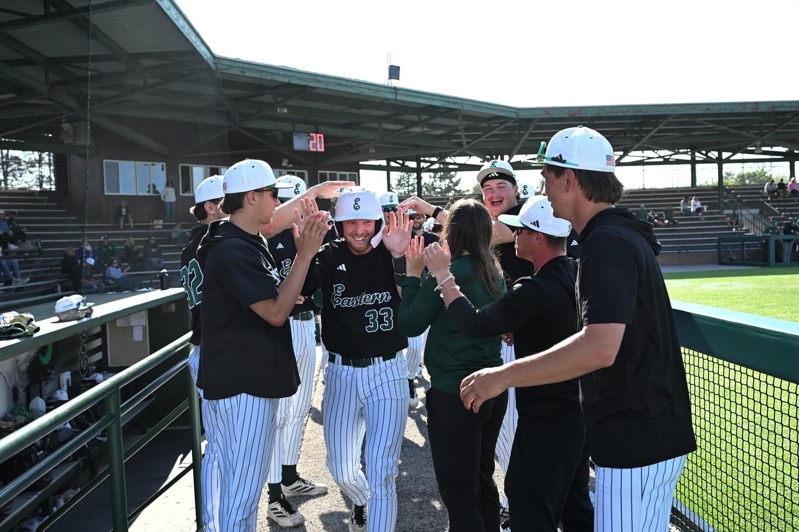 Nick Weaver celebrates in the dugout after scoring a run against Ohio at Oestrike Stadium, May 15, 2026