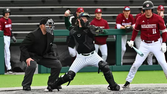 Nick Weaver throws the baseball to second base to try and catch a runner stealing against UMass at Oestrike Stadium, April 10, 2026