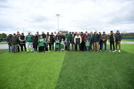 1976 EMU Baseball team and addiitonal alumni pose for a photo on 1976 CWS 50-Year Anniversary Celebration Day at Oestrike Stadium, May 2, 2026