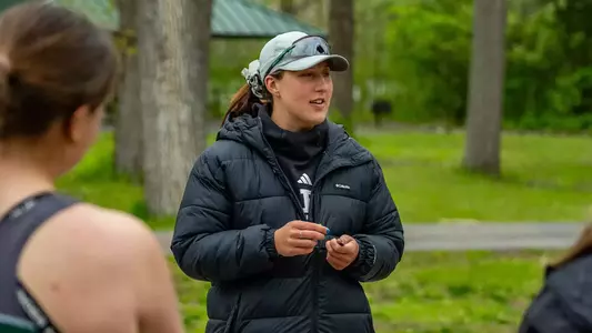 Eastern Michigan Rowing Assistant Coach Sabrina Gottschalk coaches at the EMU Rowing Course at Ford Lake on a sunny day to celebrate Senior Day against the University of Dayton Flyers, May 3, 2026