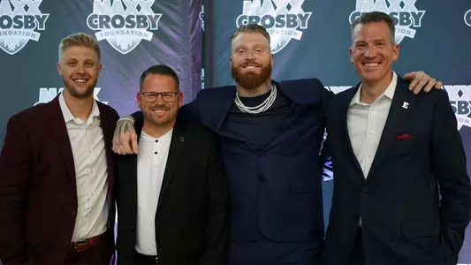 Brogan Roback, Scott Wetherbee, Maxx Crosby, and Dr. Brendan Kelly at An Evening with Maxx Crosby